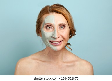 Mature Woman With Mask On Half Of Her Face Against Color Background