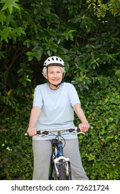 Mature Woman Mountain Biking Outside