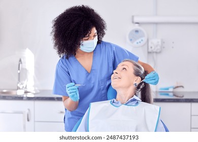 Mature woman, patient and dentist with smile for oral care in clinic for teeth whitening and treatment. People, satisfied and happy on consultation for canal procedure or dental surgery with doctor - Powered by Shutterstock