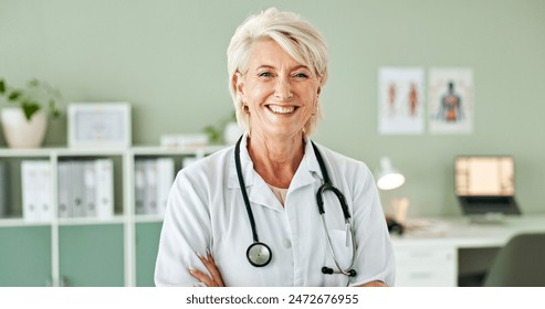 Mature woman, portrait and doctor with confidence for medical profession, career or healthcare at hospital. Female person, consultant or health professional with smile or stethoscope at office clinic - Powered by Shutterstock