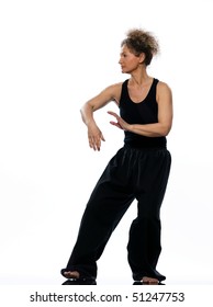 Mature Woman Praticing Tai Chi Chuan In Studio On Isolated White Background