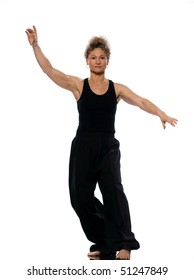 Mature Woman Praticing Tai Chi Chuan In Studio On Isolated White Background