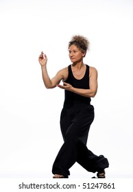 Mature Woman Praticing Tai Chi Chuan In Studio On Isolated White Background