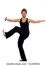 Mature Woman Praticing Tai Chi Chuan In Studio On Isolated White Background