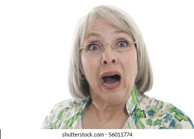 Mature Woman Scared And Shocked Isolated On White.