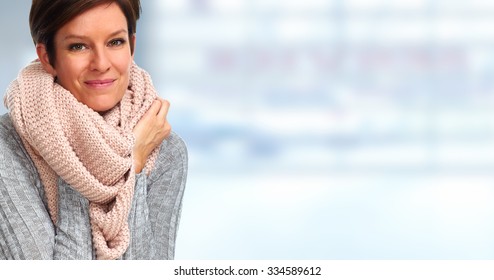 Mature Woman With Scarf. Winter And Xmas Background.