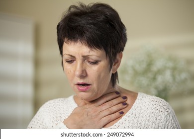 Mature Woman With Sore Throat