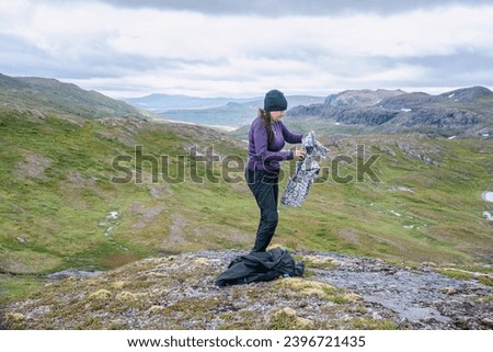 Similar – Foto Bild Junge Frau genießt nordische Landschaft