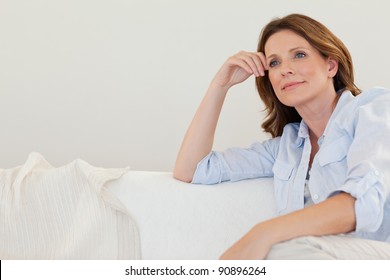 Mature Woman In Thoughts On The Couch