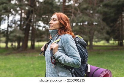 Mature Woman, Traveler Backpacking Nature Camping, Happy With Closed Eyes Breathing Fresh Air.