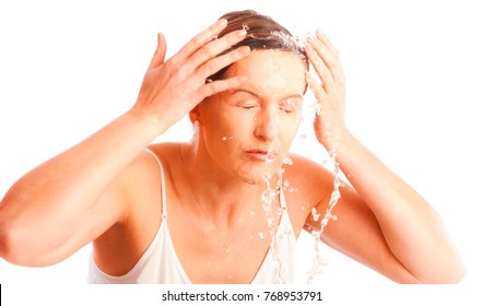 Mature Woman Washing Her Face