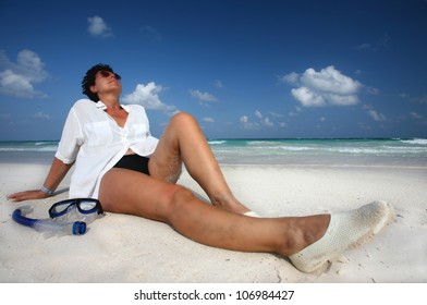 Mature Woman At The White Sand Beach On The Caribbean Coast