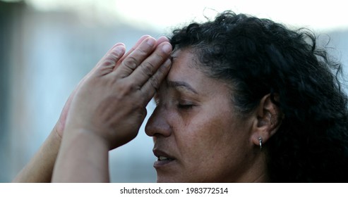 Mature Woman Worshiping God. Hispanic Person Praying To Divine Spiritual Protection