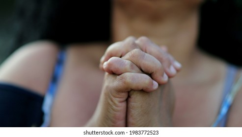 Mature Woman Worshiping God. Hispanic Person Praying To Divine Spiritual Protection