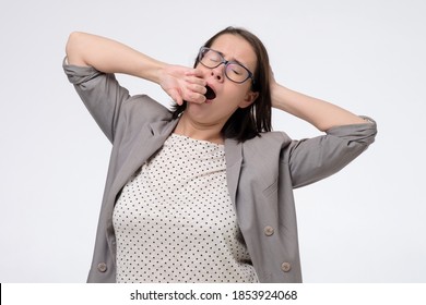 Mature Woman Yawning And Stretching After Hard Working Day. Studi Oshot.