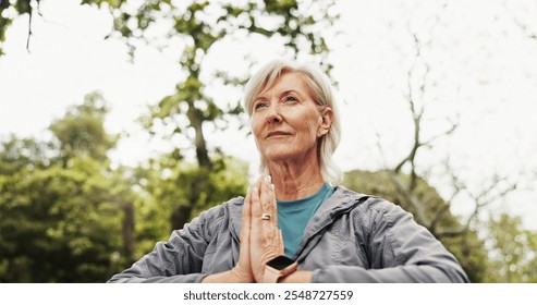 Mature, woman and yoga with namaste in nature for meditation, spiritual wellness or zen at park. Senior, female person or yogi with hands together for awareness, inner peace or healing in forest - Powered by Shutterstock