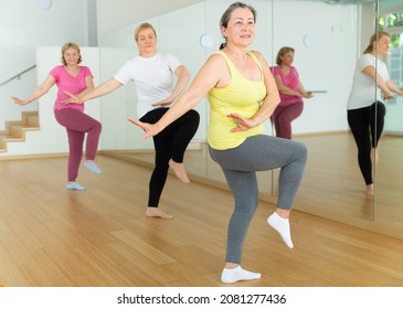 Mature Women Dancing Aerobics At Lesson In The Dance Class