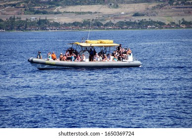 Maui, Hawaii - February, 2020:  A Small Group Of Tourist On A Whale Watching Tour.