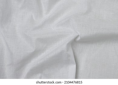 Mauled White-colored Cheese Cloth Fabric Texture Background. This Is Made Of Cotton.