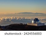 Mauna Kea summit sunset photo overlooking observatory. Breathtaking view blending science with celestial beauty. Perfect for stargazers and nature lovers!