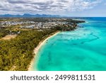 Mauritius beach aerial view of Mont Choisy beach in Grand Baie, Pereybere North. Mont Choisy, public beach in Mauritius island, Africa. Beautiful beach of Mont Choisy in Mauritius, drone aerial view.