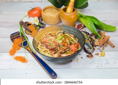 Mauritius Food, Chicken And Noodles Chassive Recipe, Served On A Plate With Decoration Food And Design Spatula.
