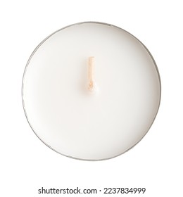 Maxi tealight, longer-burning tea light, a large tea candle, also known as nightlight, isolated from above. Tea lite, t-lite or t-candle in thin metal cup, so the wax can liquefy completely while lit.