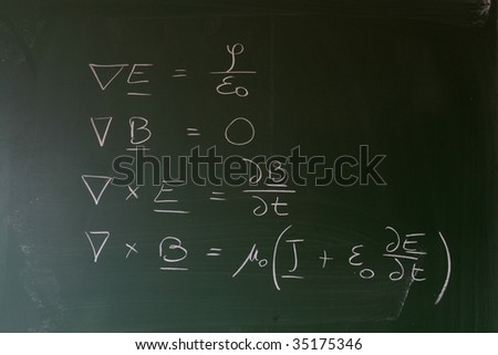 Maxwell's equations of electrodynamics written on a chalkboard