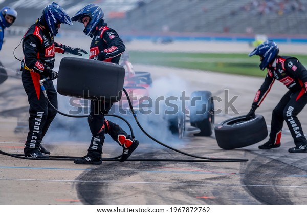 May 01, 2021 -\
Ft. Worth, Texas, USA: TONY KANAAN (48) of Salvador, Brazil brings\
his car in for service during the Genesys 300 at Texas Motor\
Speedway in Ft. Worth\
Texas.