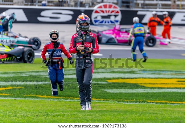 May 02, 2021 - Ft. Worth, Florida, USA:\
ALEXANDER ROSSI (27) of the United States walks back to the pits\
after being involved in a first lap wreck during race for the EXPEL\
375 at Texas Motor Speedway