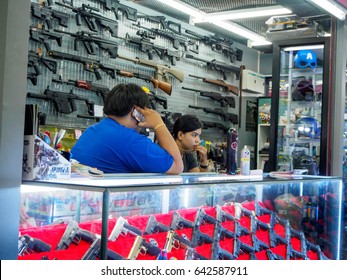 May 13, 2017. Realistic Airsoft Rifles, Shotguns, And Handguns On Display At A Store, Bangkok, Thailand. Sports And Firearms Editorial Concept.