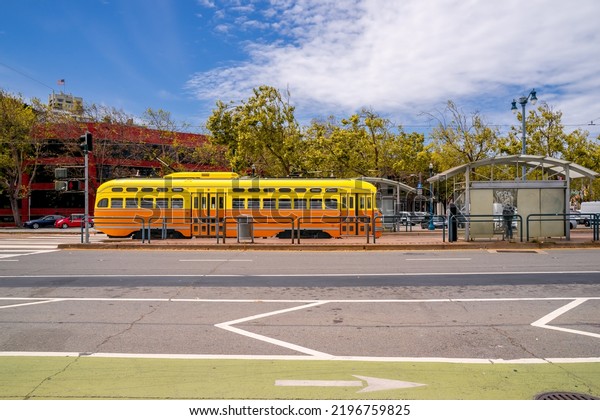 May 13, 2022, San Francisco, California, US. Hop on a\
streetcar in San Francisco. This streetcar or trolley, tram is not\
famous for tourists as cable car. Both are cheap and convenience\
for tourists. 