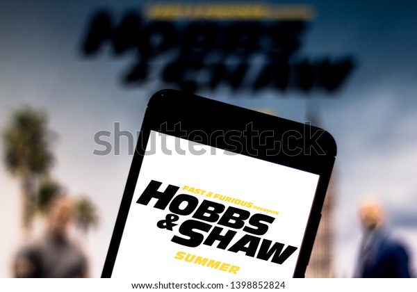 May 15, 2019, Brazil. In this photo\
illustration the Fast & Furious Presents: Hobbs & Shaw\
logo is displayed on a\
smartphone.