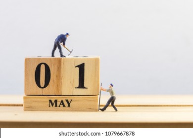 May 1st. Day 1 Of Month.  Miniature Worker Wooden Block  Calendar. Labor Day's Concept.