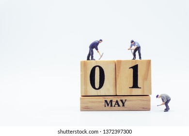 May 1st. Day 1 Of Month.  Miniature Worker Wooden Block  Calendar. Labor Day's Concept.