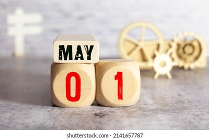 May 1st. Image Of May 1 Wooden Calendar On The Table. Spring Day, Empty Space For Text. International Workers' Day. Happy May Day Vintage Wood Calendar. Copy Space