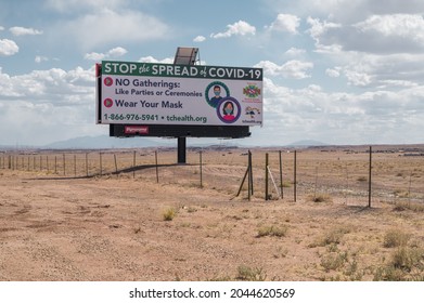 May 2, 2021, Cameron, Arizona, USA. Huge Billboard Sign On Navajo Indian Reservation Warning About Covid Spread And Encouraging Social Distancing. 