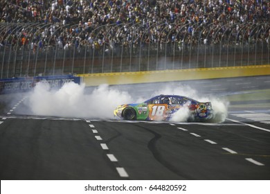 May 20, 2017 - Concord, NC, USA: Kyle Busch (18) Does A Burnout For The Fans After Winning The Monster Energy NASCAR All-Star Race At Charlotte Motor Speedway In Concord, NC.