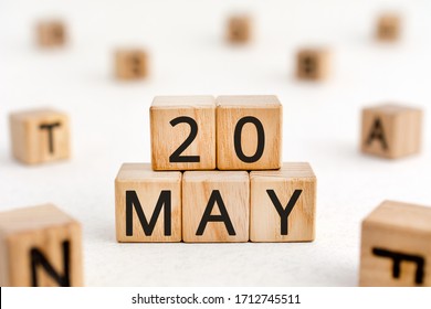 May 20 - from wooden blocks with letters, important date concept, white background random letters around - Shutterstock ID 1712745511