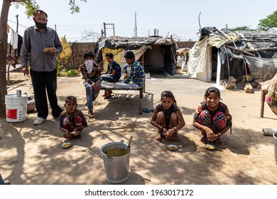 May 2020 Sirsa,india
Migrants Wait In Queues To Receive Food Being Distributed By The Volunteers During Covid19 Lock Down