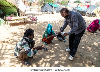 May 2020 Sirsa,india
Migrants Wait In Queues To Receive Food Being Distributed By The Volunteers During Covid19 Lock Down