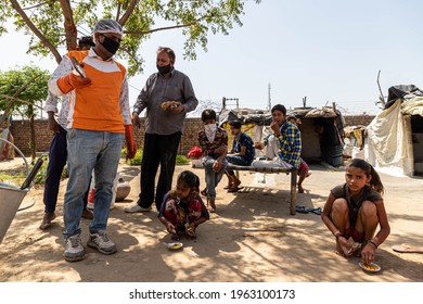 May 2020 Sirsa,india
Migrants Wait In Queues To Receive Food Being Distributed By The Volunteers During Covid19 Lock Down