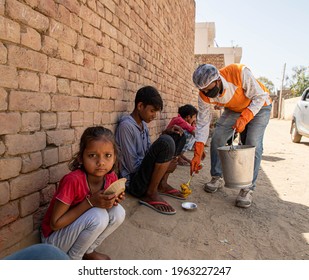 May 2020 Sirsa,india
Migrants Wait In Queues To Receive Food Being Distributed By The Volunteers During Covid19 Lock Down