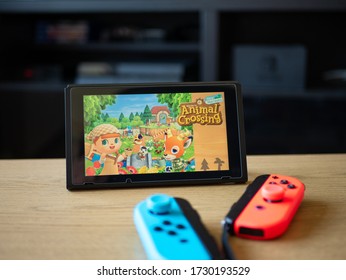 May 2020, UK: Nintendo Switch Animal Crossing New Horizons With Joy Con Neon Controllers