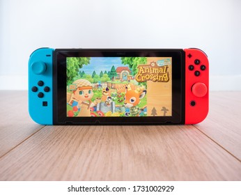 May 2020, UK: Nintendo Switch Animal Crossing New Horizons Game On White Studio Background