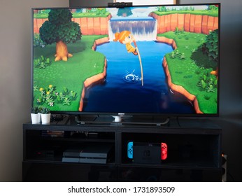 May 2020, UK: Nintendo Switch Animal Crossing New Horizons Character On Tv Monitor