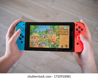 May 2020, UK: Nintendo Switch Animal Crossing New Horizons Handheld Console View From Player