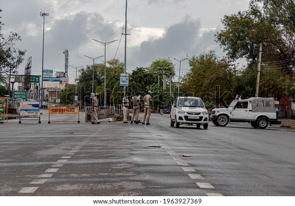may \
2020,sirsa,india\
police checking at entry point to restrict people\
from entering delhi during lock down under COVID 19 conona virus\
pendmic.,selective focus on\
subject.