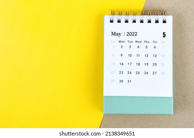The May 2022 desk calendar on beautiful background.