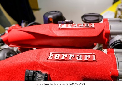 May 2022 Modena, Italy: Ferrari's Red Sportscar Engine Close-up. Automobile Details. Car Repair